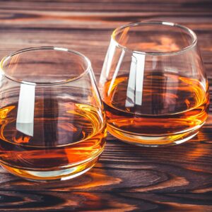 two-glass-of-whiskey-cognac-brandy-on-a-dark-bro-2022-05-26-22-02-09-utc